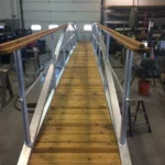 Arch ramp with wooden decking handrails, ramp.